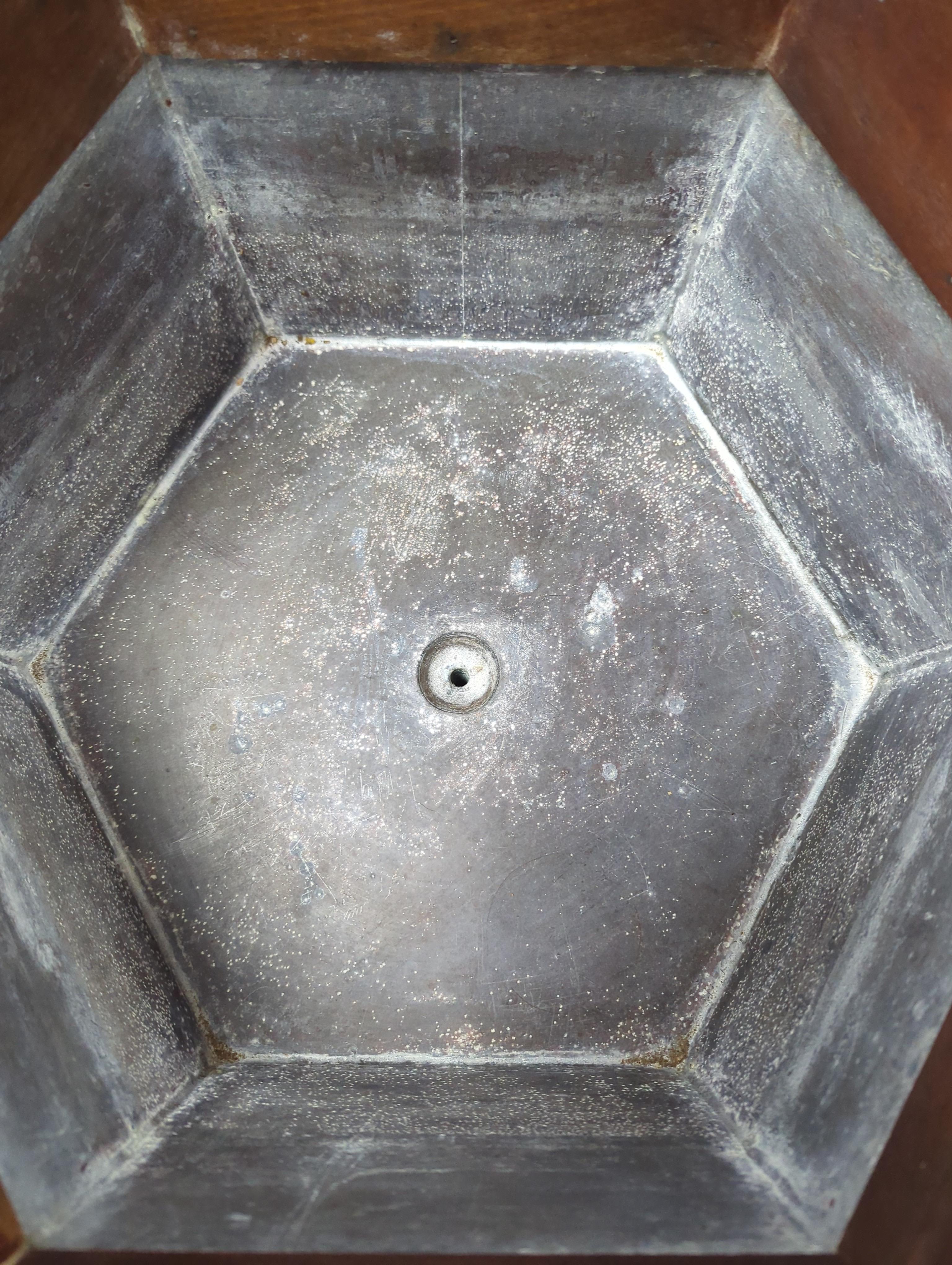 A George III hexagonal brass-bound wine cooler, width 48cm, height 66cm